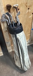 Green golf bag with call away clubs