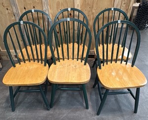 6 wooden dining chairs with green backs and legs