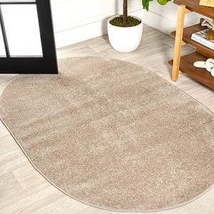 JONATHAN Y Haze Solid Low-Pile Beige 4x6 Oval Indoor Area Rug,