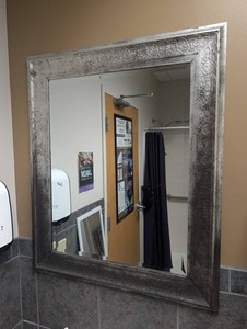 Ornate Embossed Metal Framed Wall Mirror