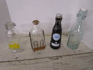 Four Vintage Collector Milk Bottles