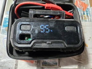 HopCrew HH6 Portable Jump Starter and Power Bank with Type-C and USB Outputs - Light Button is Pushed in - Powers On