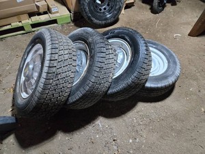 Goodyear Tires Set with 3 Chevrolet Hubcaps P23570R16, 8x6.5