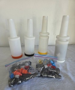 4 - Store and Pour Service Bottles.  2 Bags of Bottle Pour Spouts included.