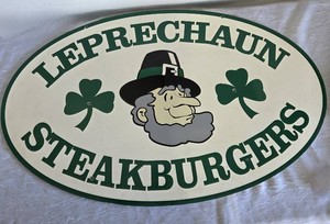 3 T x 22 W x 14 Thick - Leprechaun Steak Burgers Sign in Excellent Shape. 26 T x 15 W x 12 Thick Stand Alone Leprechaun Sign
