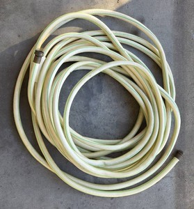 25 Garden Hose. Pre-owned.