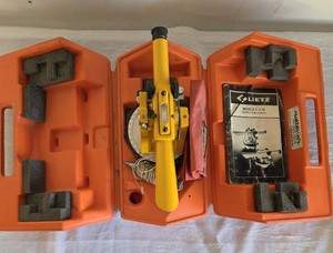 Vintage Lietz Model 20 Transit Level (Builders transit) in its original bright orange carrying case, complete with accessories like a plumb bob and instruction manual. Pre-owned