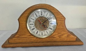 Oak (solid wood) Mantel and Table Clock - works - Has new motor installed. 20" W x 10" T.  See Video (Click on it twice to play)