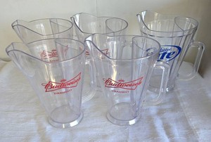 Five heavy duty acrylic pitchers. 4-Budweiser, 1-Miller Lite. Pre-owned, excellent shape - no cracks