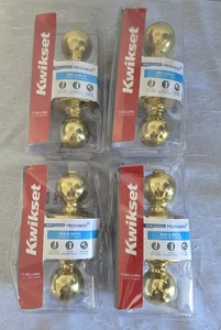 New in box. 4 -KWIKSET  Bed and Bath Locking Door Knobs. Pre-owned