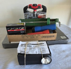 Misc. Tools -  Kneeling pad, caulking gun, 3 flashlights, socket and bit set, tire inflator, screwdriver set, etc.  Pre-owned