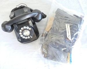 Vintage Rotary Phone and Phone Lineman Tools.