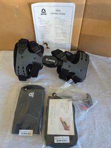 Aryse Knee Brace and 2-Knee Wraps.  Pre-owned, but like new condition.
