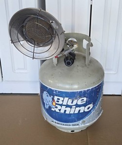 Radiant Propane Tank Top Heater with a empty 20 lb.&nbsp propane tank.  The red knob needs to be held in to start it.