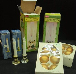 2 NEW HURRICANE LAMPS - 2 NEW LED SENSOR CANDLES - 2 BOXES OF GLASS BULBS