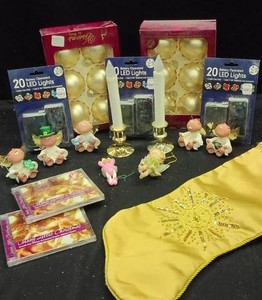 2 BOXES OF GOLD TREE BULBS  7 FIGURINES  GOLD STOCKING  3 BOXES OF LED LIGHTS
