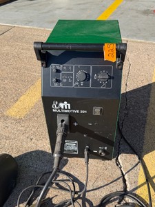 Migatronic Multimotive 221 Welder with accessories and welding helmet