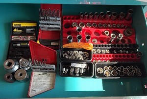 Socket and drill bit sets