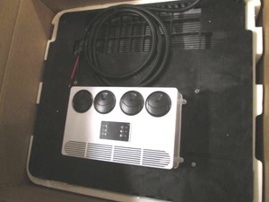 New 12 Volt ultra thin rooftop air conditioner top mount unit for RV, truck, bus, trailer, or other mobile or small space
