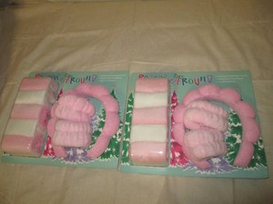 2 Gift packs of spa accessories including 5 makeup removing towels, 1 bubble spa headband and 2 spa wristbands in each pack