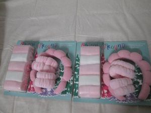 2 Gift packs of spa accessories including 5 makeup removing towels, 1 bubble spa headband and 2 spa wristbands in each pack
