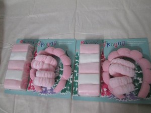 2 Gift packs of spa accessories including 5 makeup removing towels, 1 bubble spa headband and 2 spa wristbands in each pack