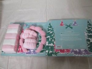 2 Gift packs of spa accessories including 5 makeup removing towels, 1 bubble spa headband and 2 spa wristbands in each pack