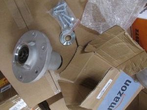 Zero-turn lawn mower deck pulley