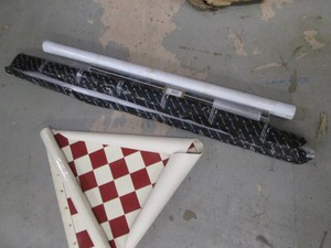 Pair of 15x15in vinyl checkerboard mats and assorted window film