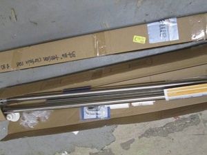 2 varying colorsize tension curtain rods
