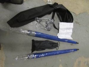 Pair on clamp-on sunshade umbrellas