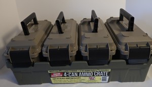 Fleet Farm branded green plastic ammunition storage cans with individual carry handles and locking latches, organized in a matching molded transport tray.
