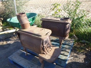 2 Vintage Cast-Iron Wood Burning Stoves