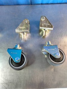 Four swivel caster wheels with threaded or bolt-hole stems