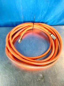 Flexible compressed air hose with brass fittings