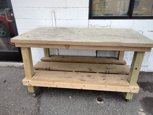 Heavy-duty, rolling wooden workbench