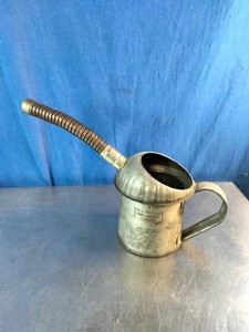 Galvanized metal oil measure and dispenser can,