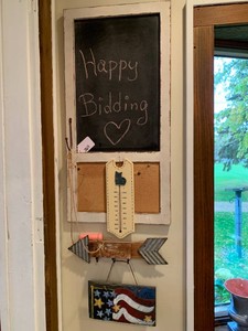 Chalkboard, chalk, thermometer with American flag