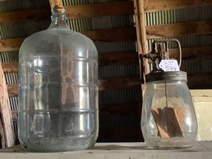 Butter churn with large glass bottle