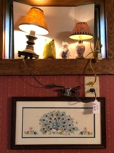 Miniature lamps, peacock picture and cat figurines