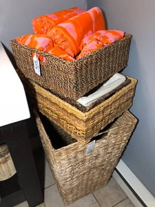 Assorted size baskets, metal waste baskets, scale, new orange and pink towels