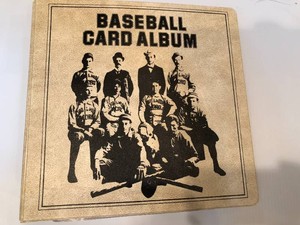 Baseball card album with assorted baseball cards