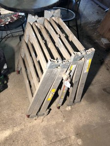 Two metal ladder sections