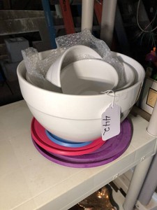 White ceramic nesting bowl set with lids
