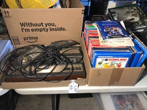 Mattel Electronics IntelliVision console, cartridges and pamphlets