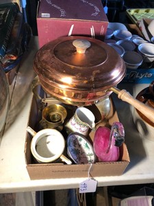 Copper colored fondue pot, brass candle holder, glass flamingo and other glassware