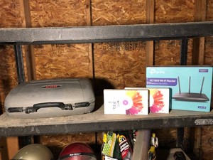 Wi-Fi router, My Heritage DNA, RCA video camera in case