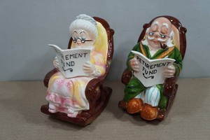 Old Man and Woman Retirement Fund Piggy Banks