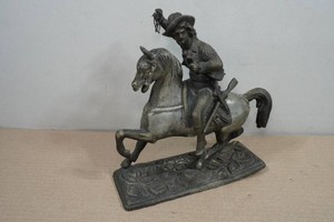 Cast Horse and Cowboy Statue