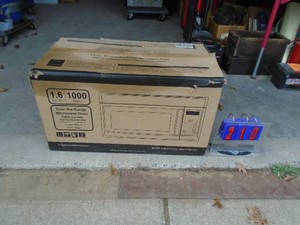1.6 cubic foot 1000 watt over the range microwave. New in the box. As shown.